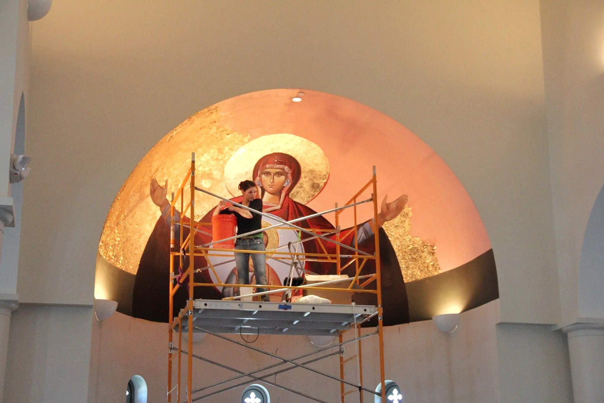 A dome painting in progress on scaffolding