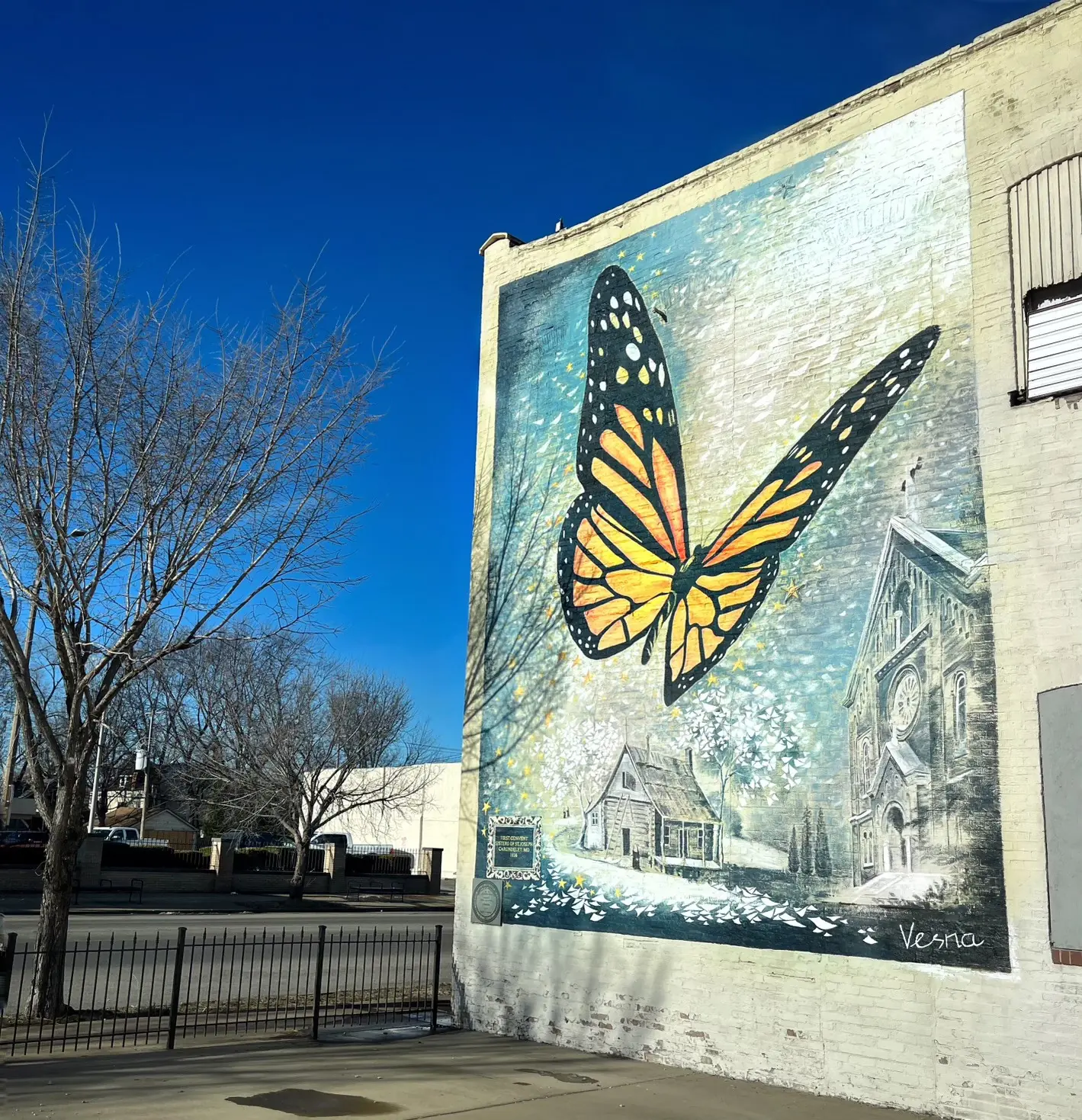 The monarch butterfly mural seen from the street